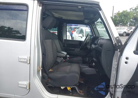 2011 Jeep Wrangler Unlimited Sport z USA, uszkodzony, nr VIN 1J4BA3H14BL597735